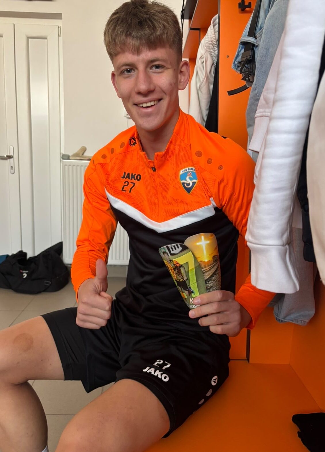 professional football player with Kickson shin guards